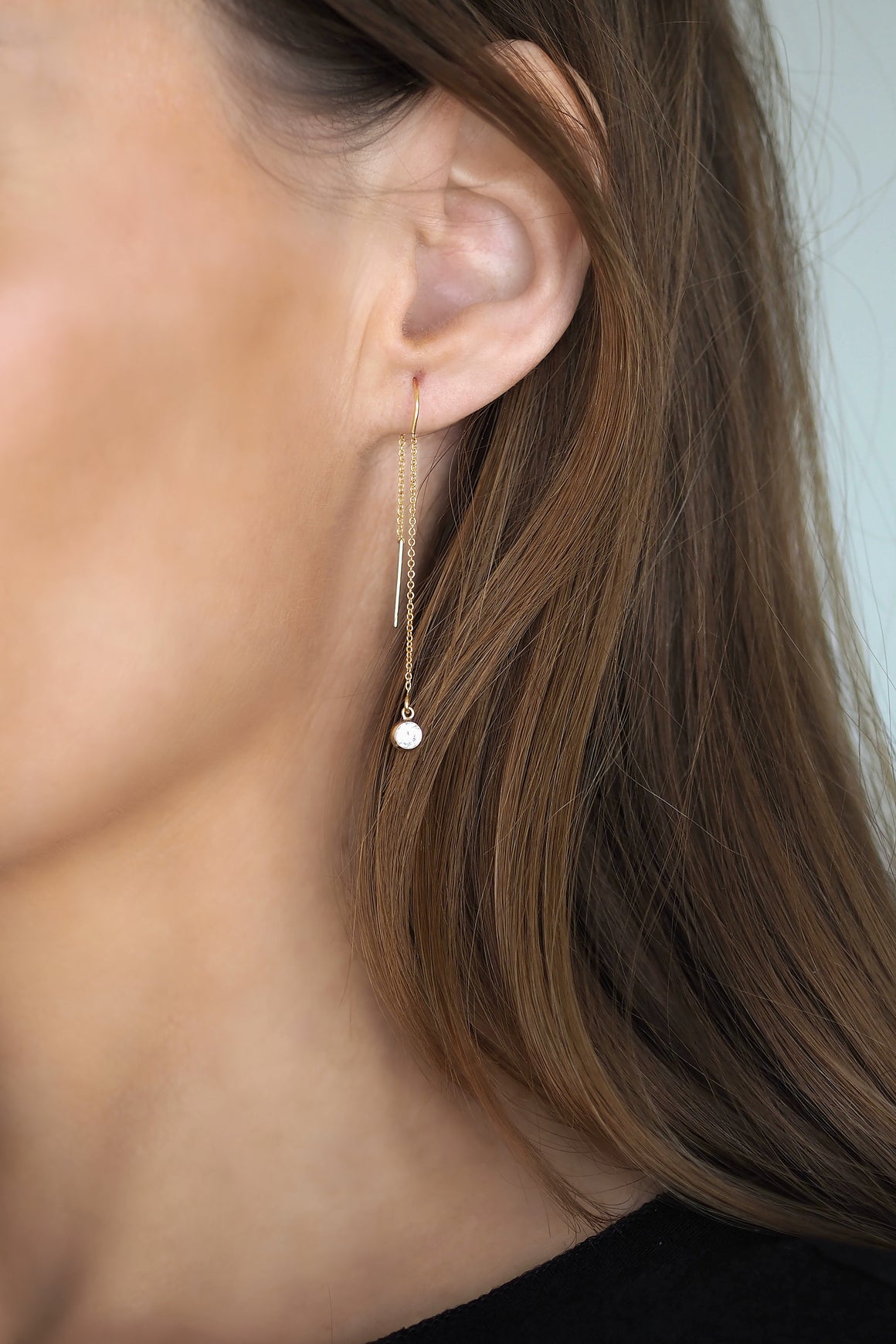 White solitaire long earrings
